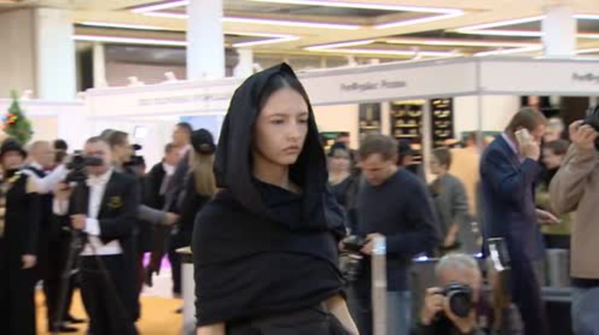 Russia: Funeral fashions, hip hearses and cool coffins on show at Necropolis-Tanexpo