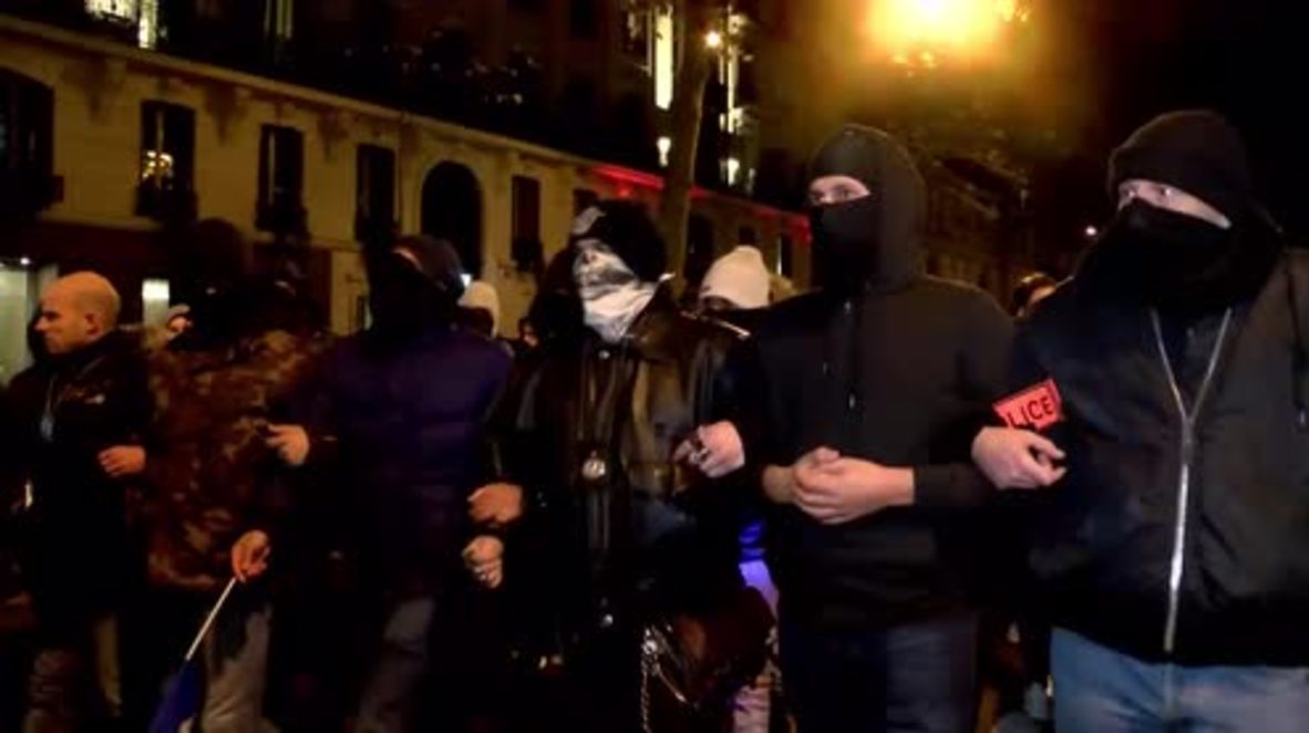 France: Balaclava clad police officers march through Paris