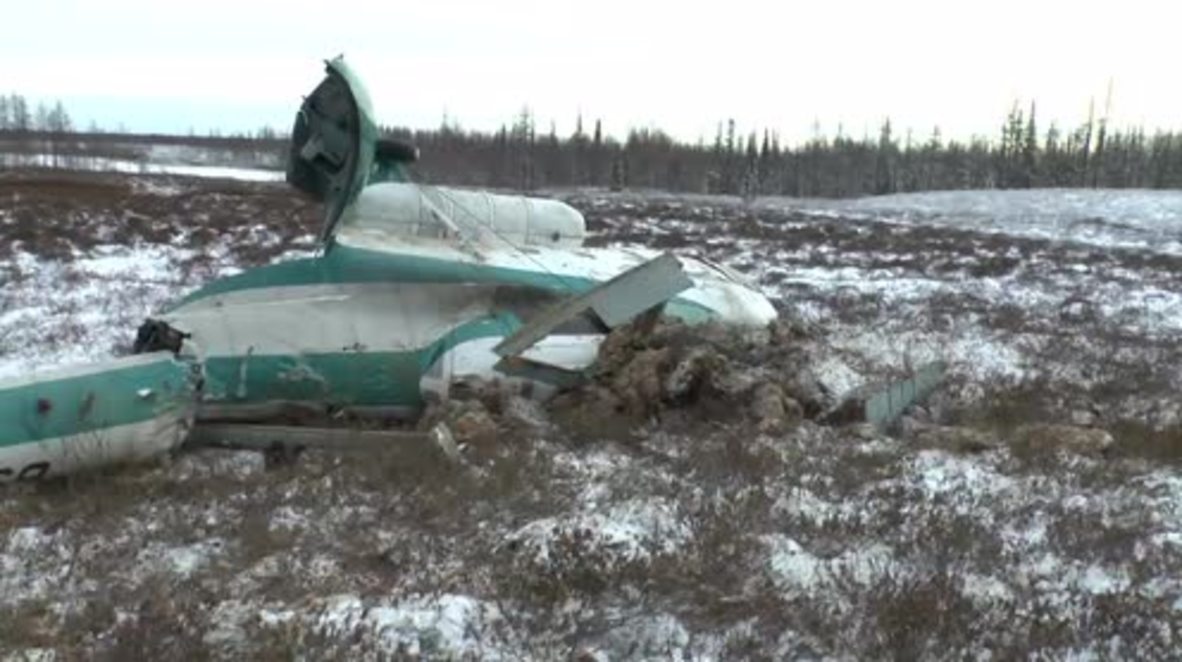 Russia: EMERCOM crews inspect site of deadly helicopter crash-landing