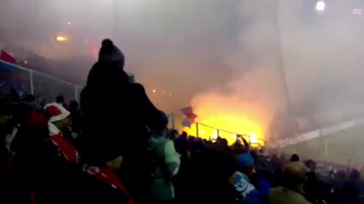 Russia: Fans set fire to stands during Moscow derby