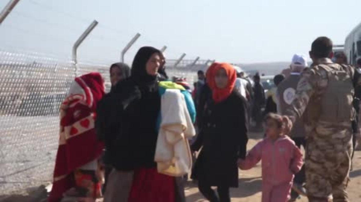 Iraq: Women ditch burqas as they arrive at IDP camp after fleeing Mosul