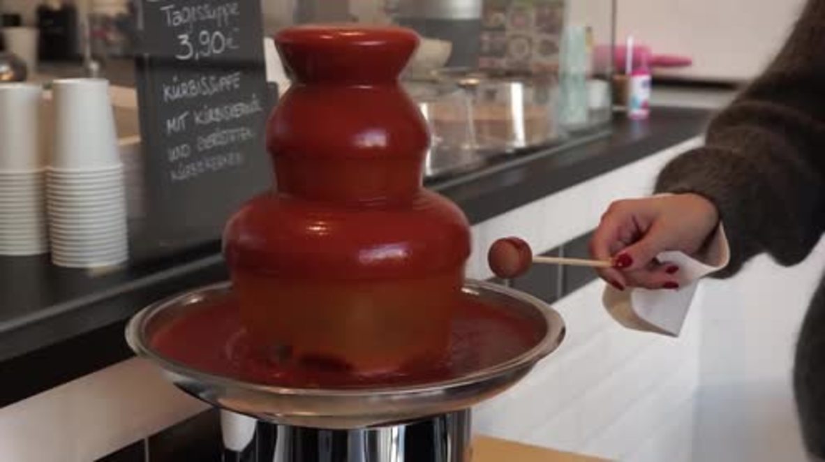 Germany: This currywurst FONDUE fountain is either the best thing ever… or the wurst