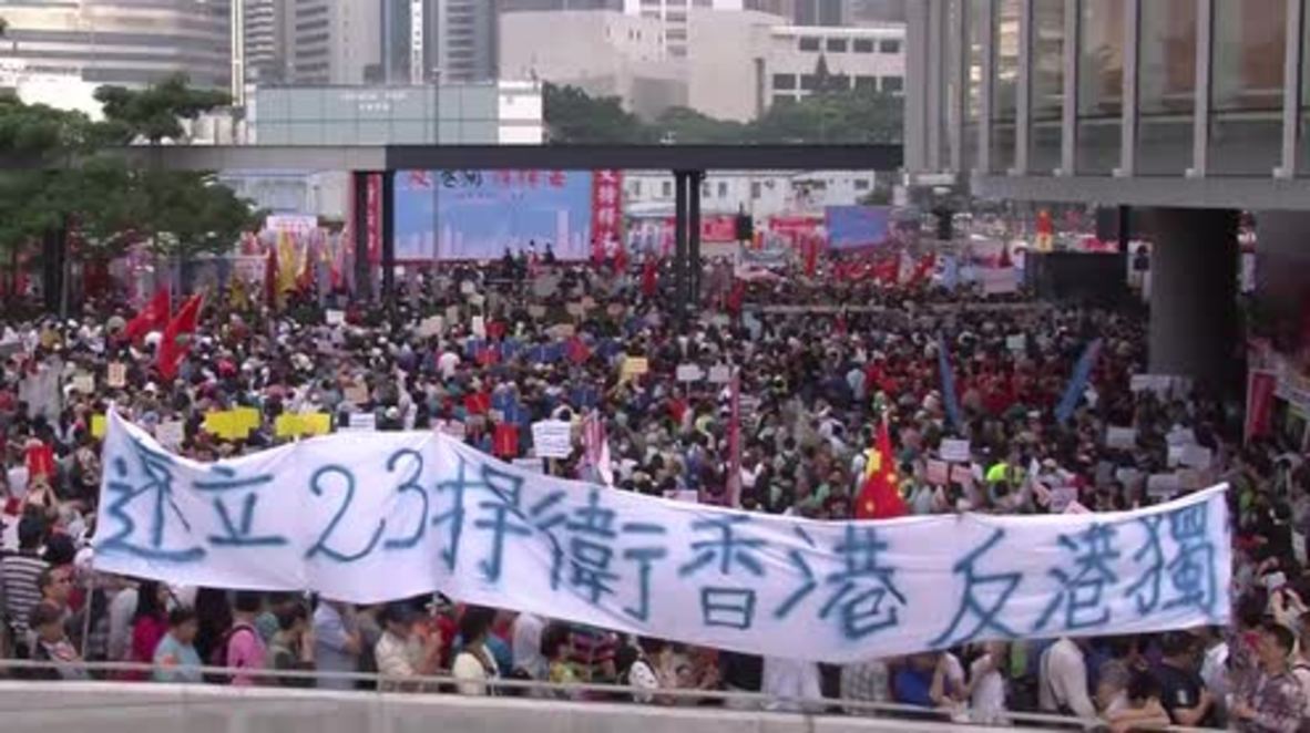 Hong Kong: Tens of thousands march to oppose HK's independence from China