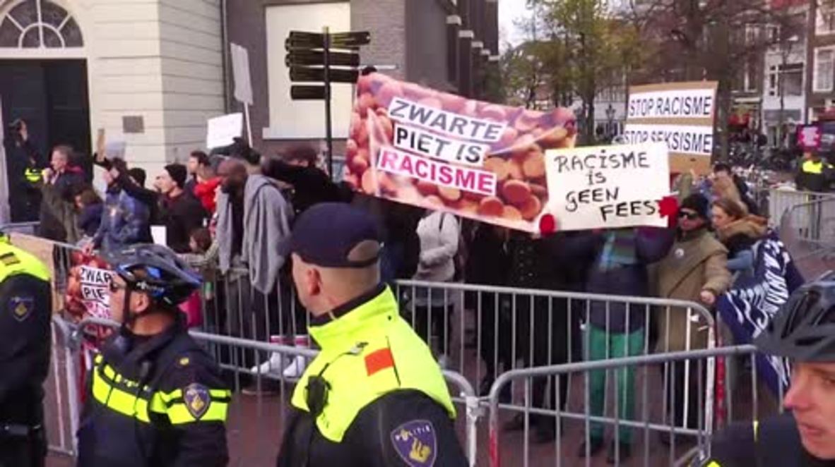 Netherlands: Police keep protesters apart at demo against 'Black Pete' parade