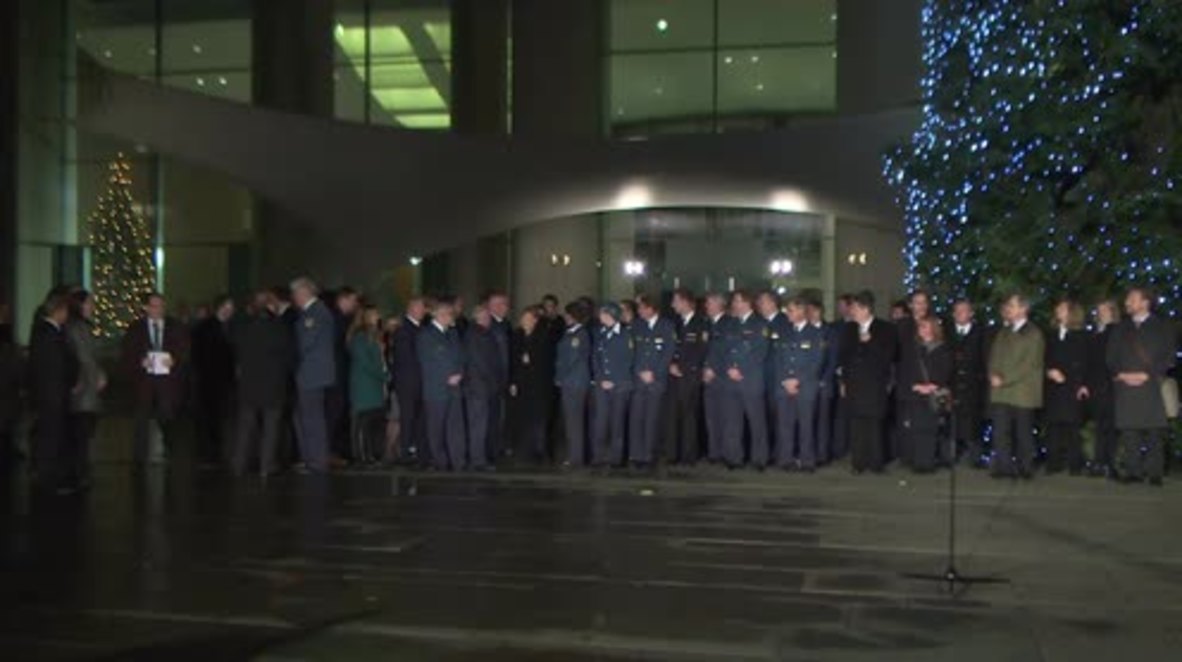 Germany: Merkel inaugurates Chancellery's towering Christmas trees