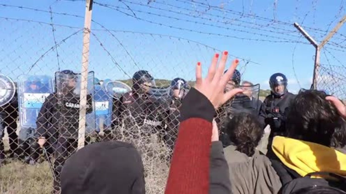 Italy: Anti-Nato protesters clash with police at military base in Sardinia