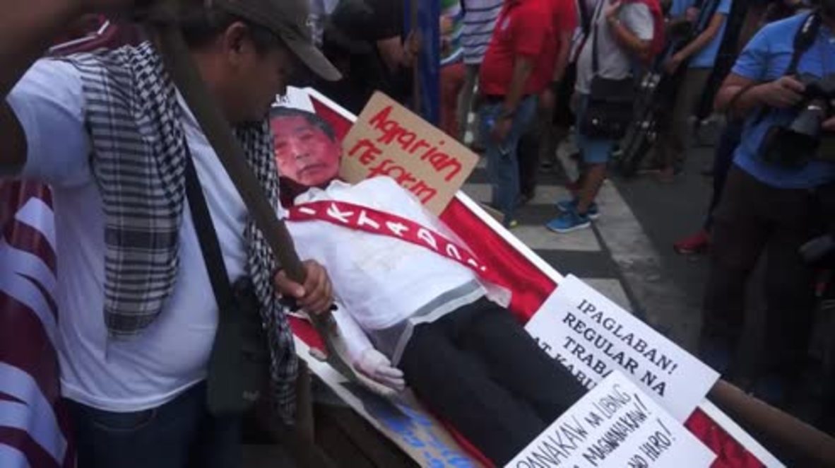 Philippines: Dozens protest against 'hero burial' for dictator Marcos