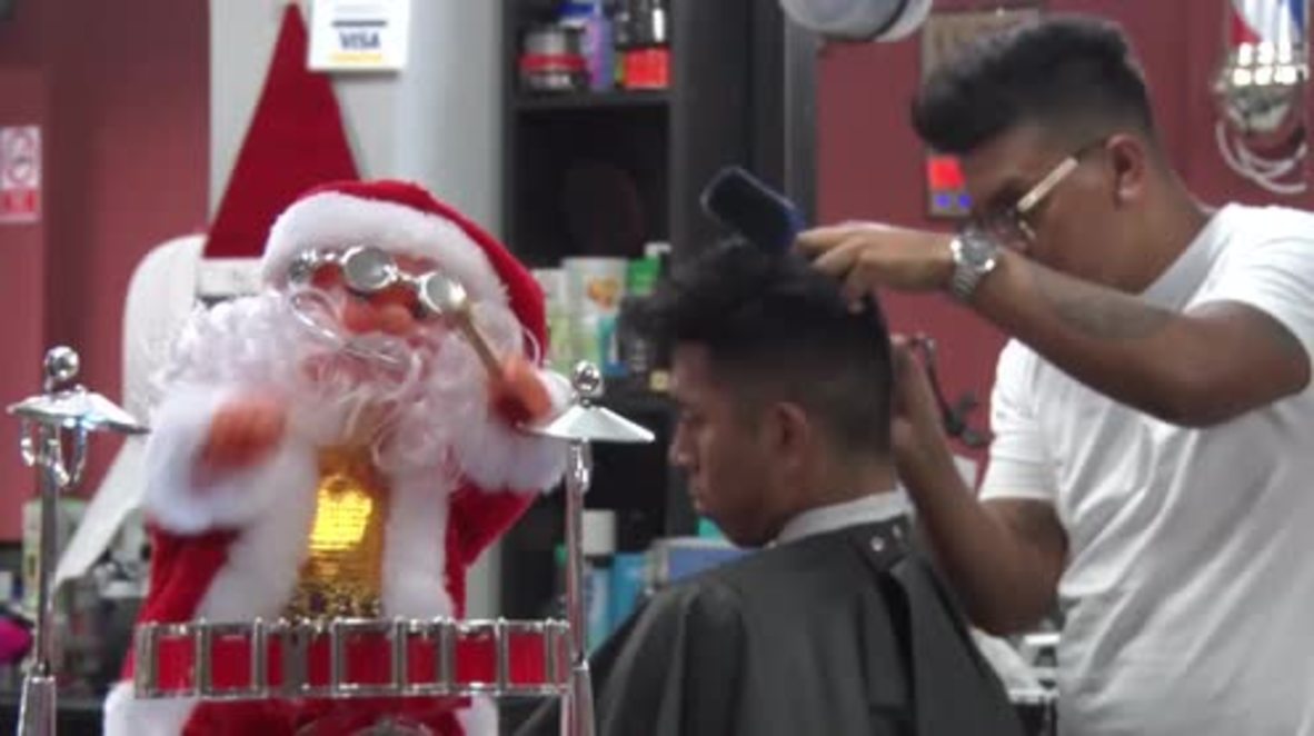 Peru: Hairy Christmas! Lima barbershop offers festive cuts to customers