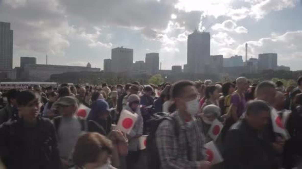 Japan: Thousands gather at Imperial Palace to greet Emperor on his 83 birthday
