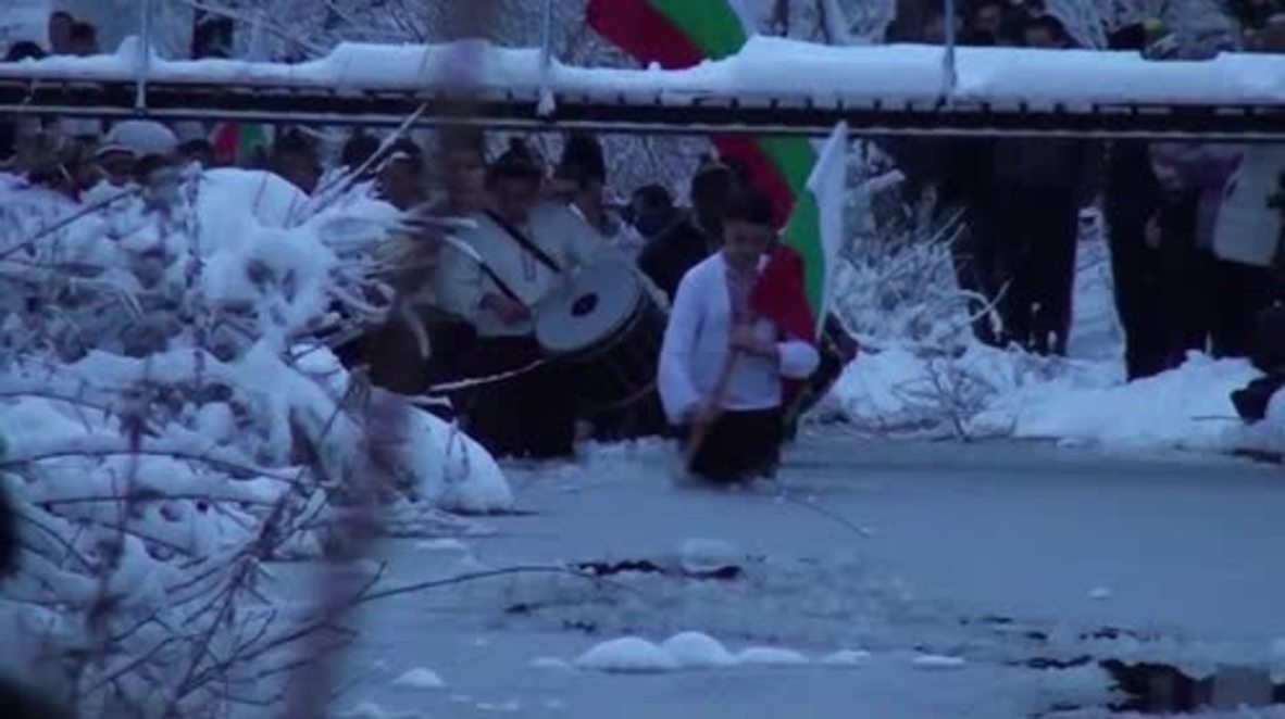 Bulgaria: Hardy men dance the Hora in the icy Tundzha river for Epiphany