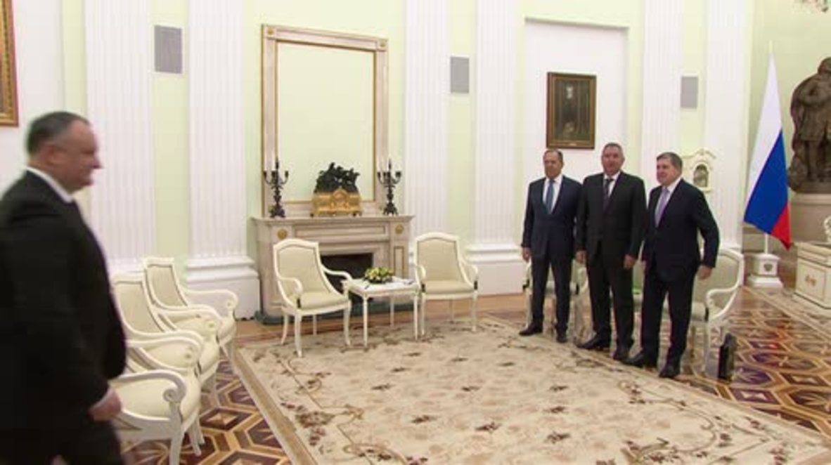Russia: Putin greets new Moldovan pres. in Moscow, leaders tout resumption of ties