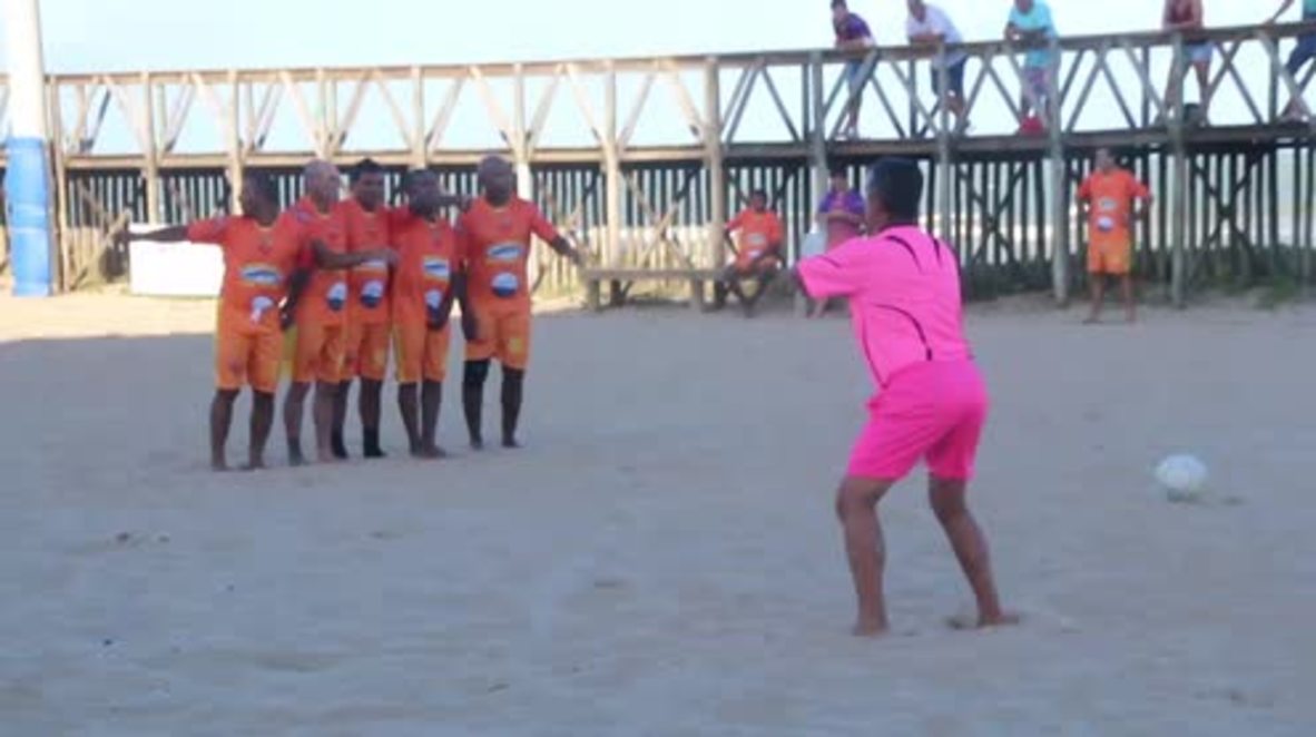 Brazil: Pretty in Pink! This referee is more fun to watch than the game he is officiating