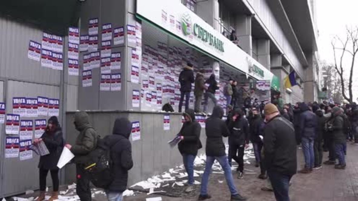 Ukraine: Protesters deface Russian-owned banks in Kiev