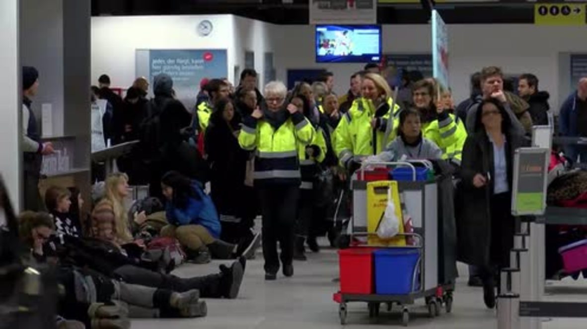 Germany: Passengers left stranded in Berlin as airport workers go on strike