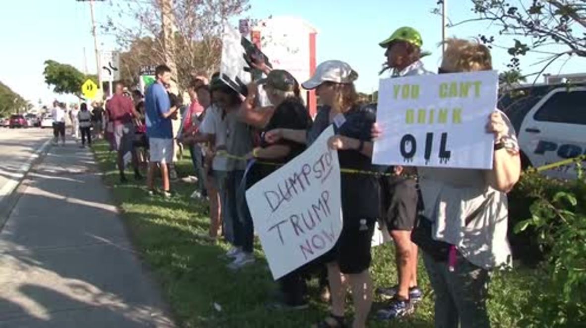 USA: Protesters line streets of Mar-a-Lago as Trump departs for DC