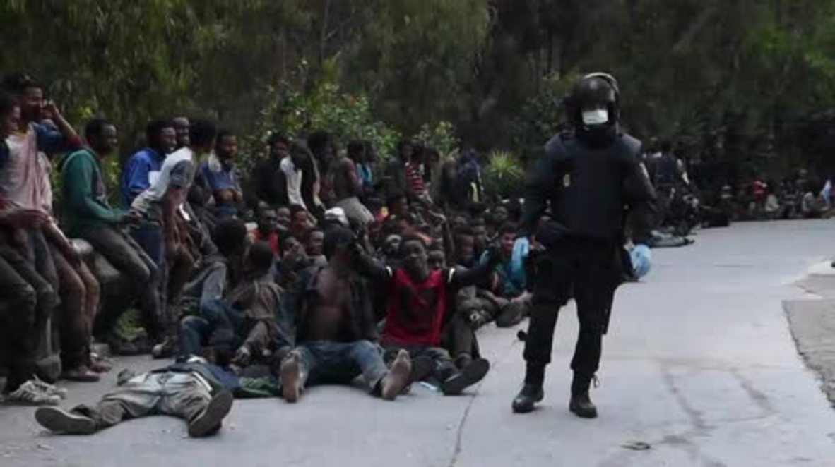 Spain: Refugees receive assistance after scaling Ceuta border fence