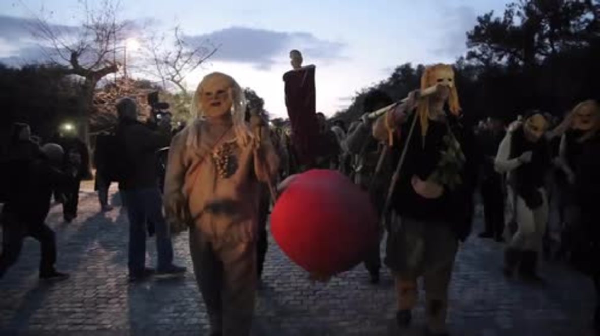 Greece: Dionysian worshippers carry giant phallus across Athens