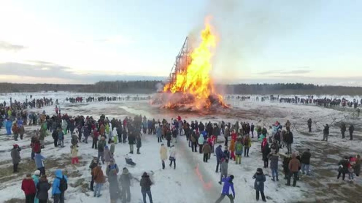 Russia: Drone captures massive sculpture burning at Maslenitsa party