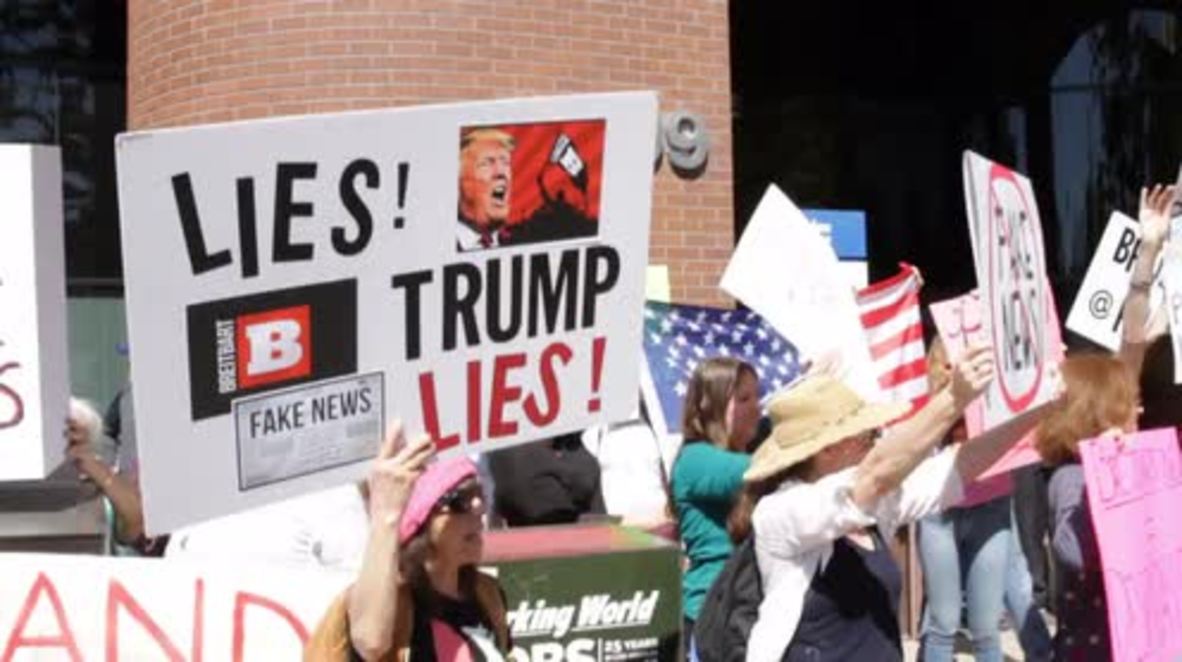USA: Anti-Trumpers decry 'fake news' outside Breitbart HQ in Los Angeles