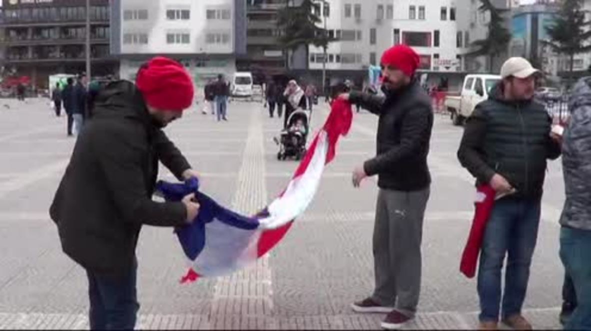 Turkey: Protesters burn Dutch - or is it French? - flag after minister deported from Holland