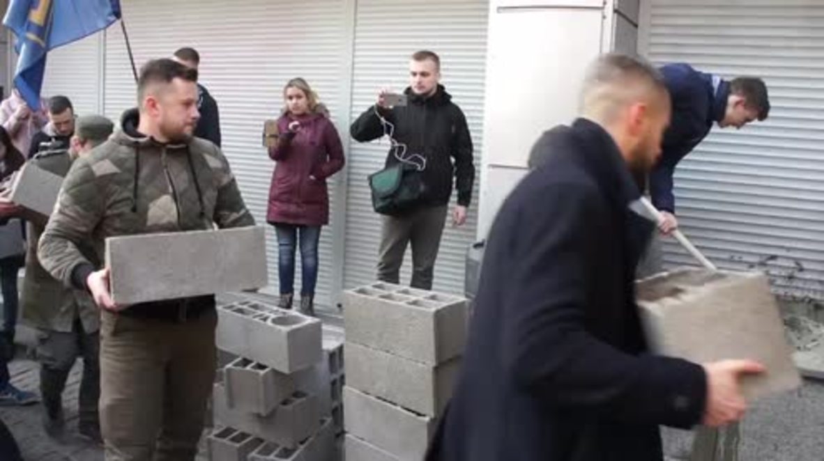 Ukraine: Nationalists brick up Russian-owned Sberbank in central Kiev