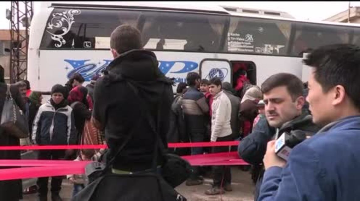 Syria: Buses transport opposition fighters and families from Homs