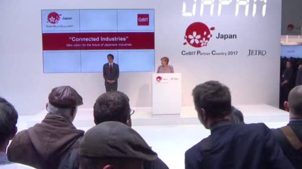 Germany: Merkel and Abe check out new technologies at CeBIT