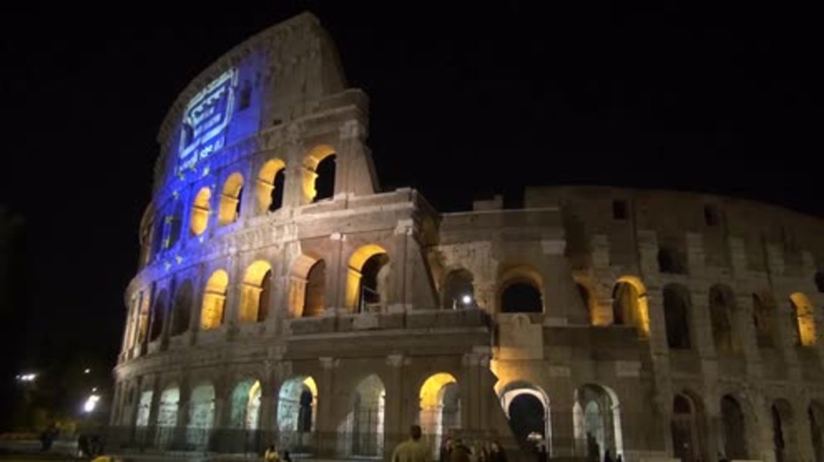 Italy: Young European Federalists celebrate Treaty of Rome anniv. outside Colosseum