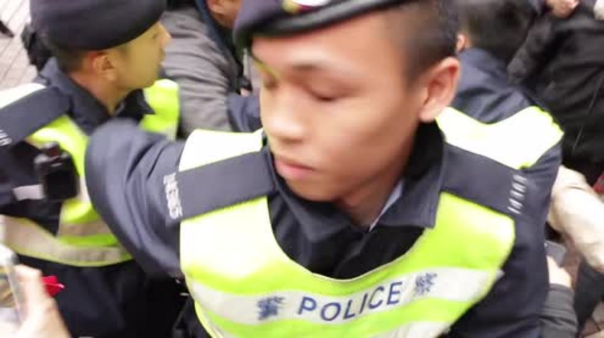 Hong Kong: Protesters clash with police following election of pro-Beijing candidate Carrie Lam