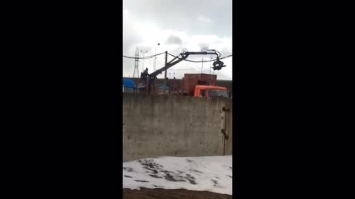 Russia: 'You spin me right round!' – workmen turn crane into theme park ride