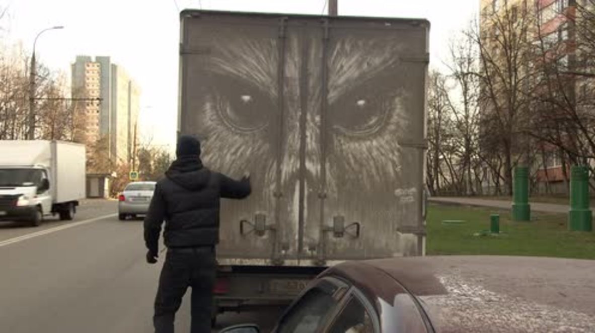 Russia: Filthy minded! Street artist draws masterpieces onto DIRTY trucks