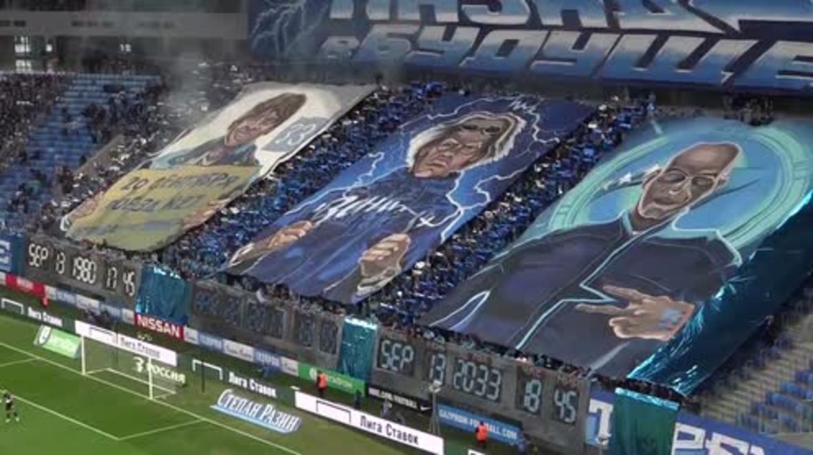 Russia: Zenit fans display 'Back to Future' banners at new stadium's opening game