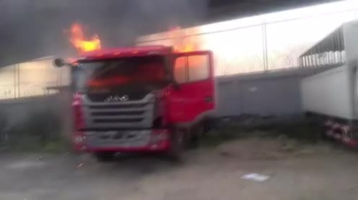 Venezuela: Trucks burn as anti-govt. protests enter fourth week