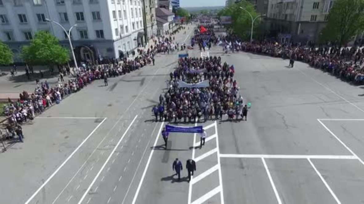 Ukraine: Drone captures 1000s marching through Lugansk on May Day