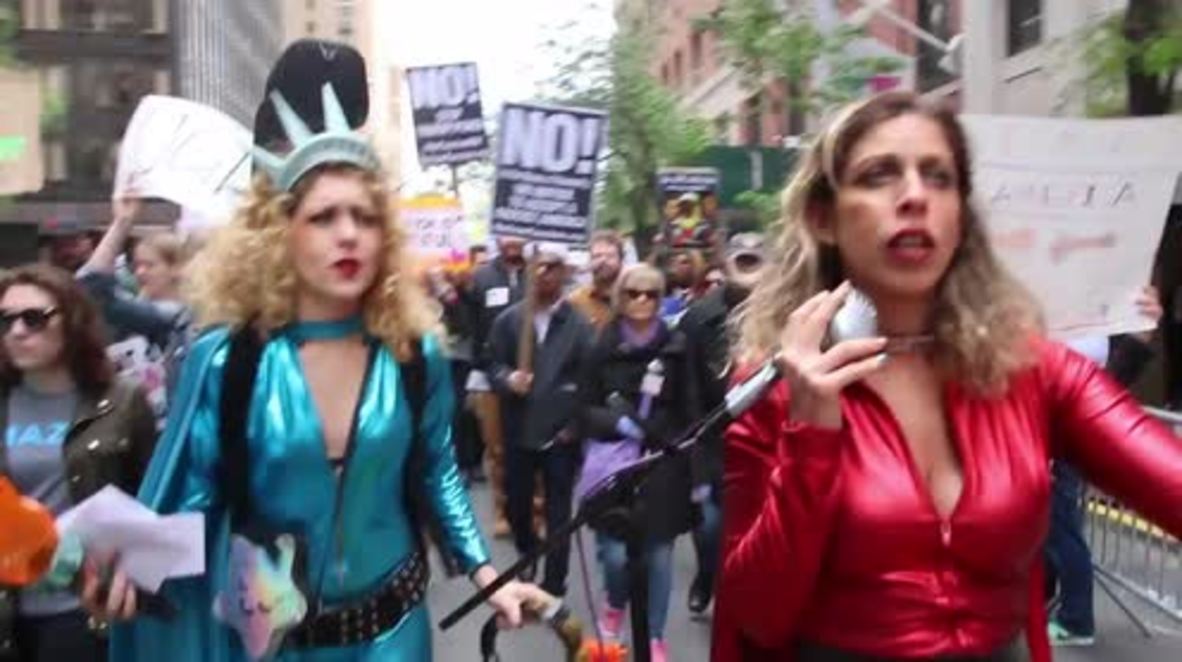 USA: Pro-immigration 'Marcha De Mayo' activists march on Trump Tower in NYC