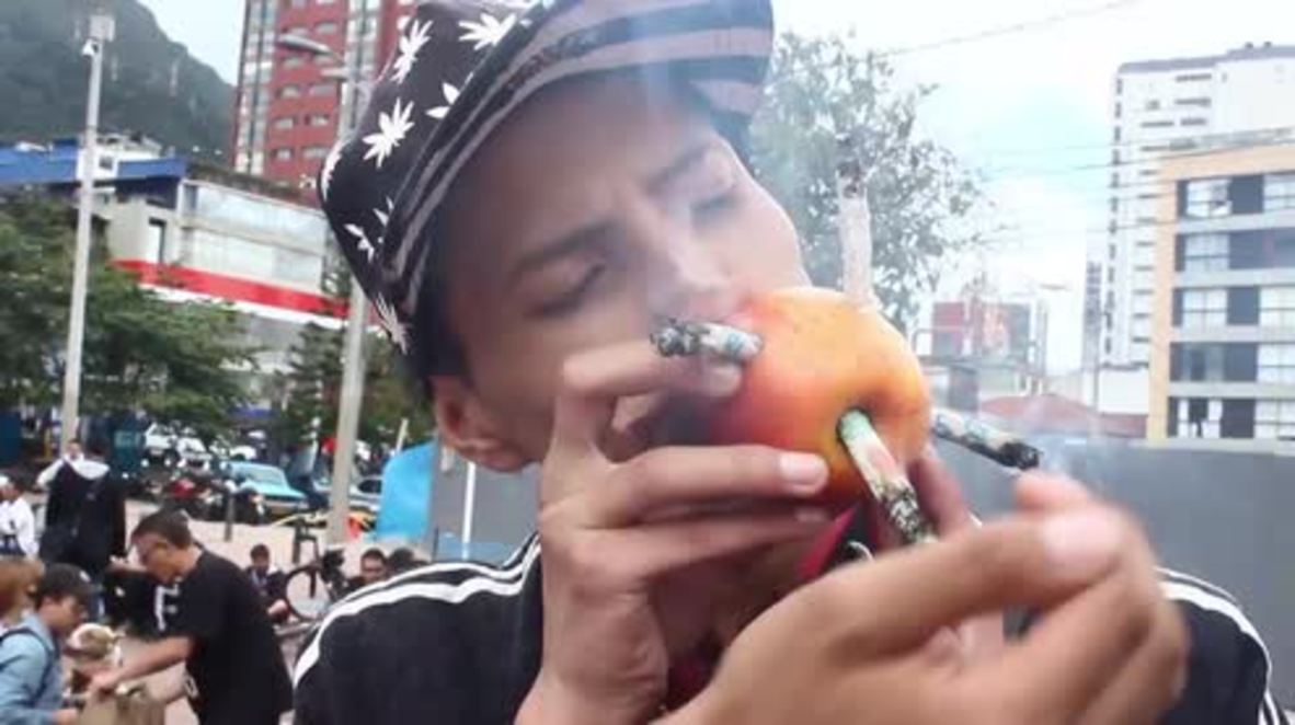 Colombia: Pro-marijuana protesters light up with makeshift bongs in Bogota