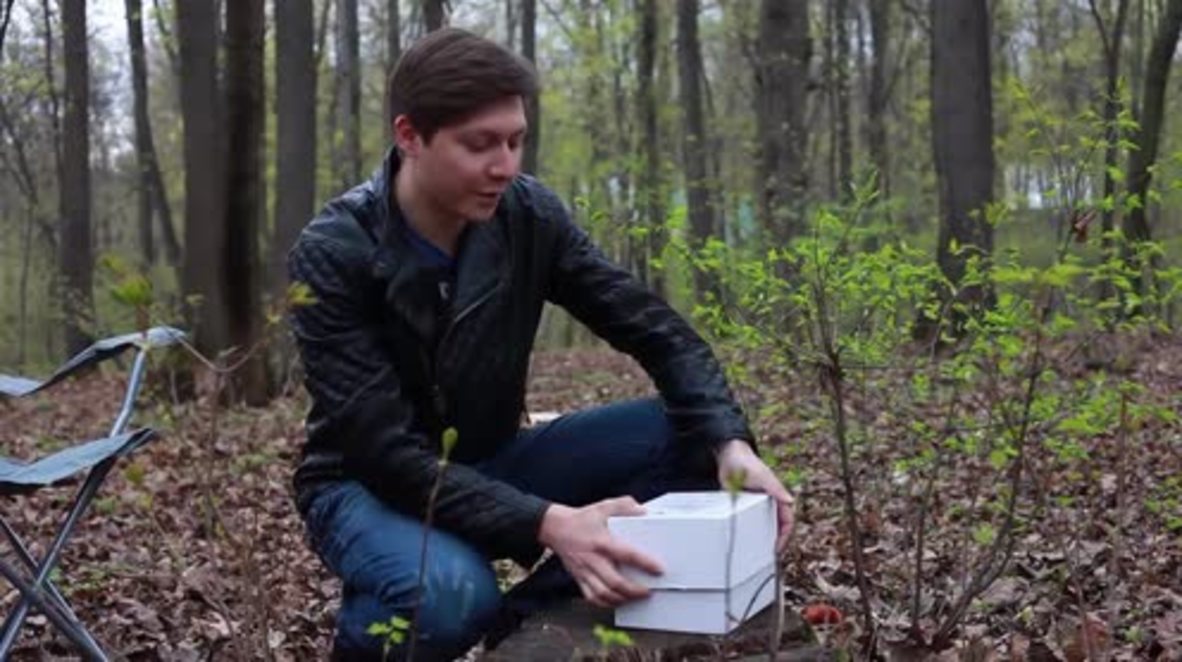 Russia: Back to basics, kind of… Man invents brazier that cooks sausages and charges PHONES