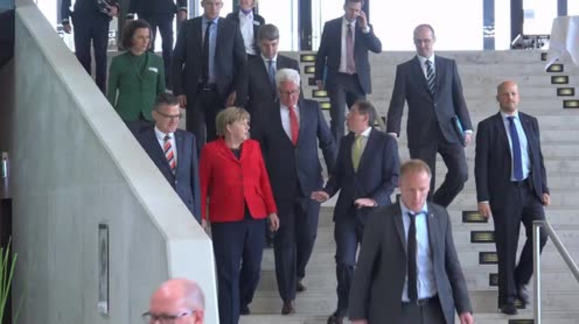 Germany: Merkel says refugees must abide by rules of 'German humanity' in volunteer address