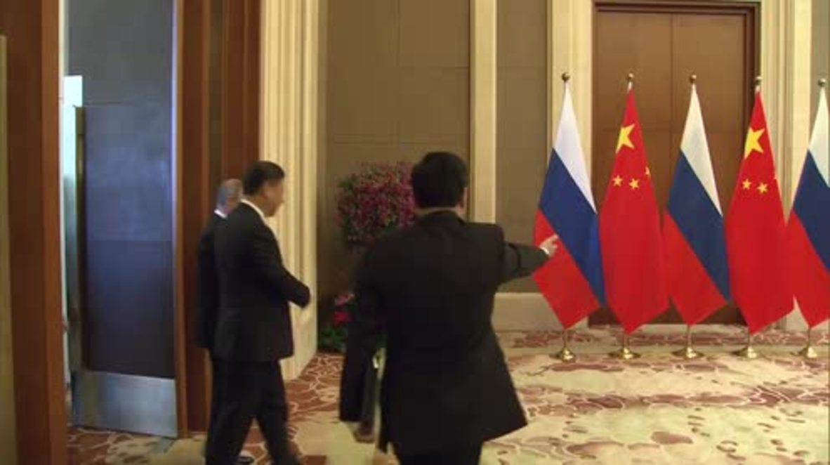 China: Putin discusses economic ties with Xi Jinping