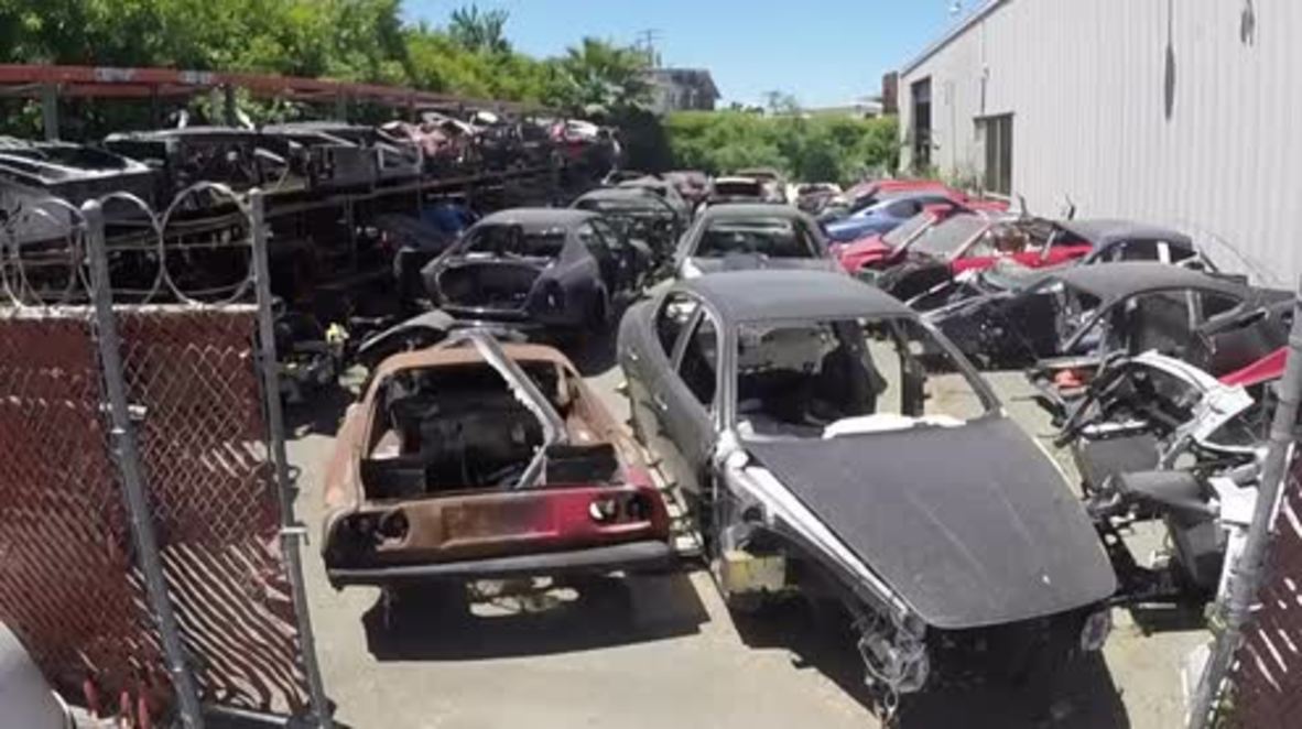 USA: Drone captures mass exotic car graveyard, where Ferraris are laid to rest