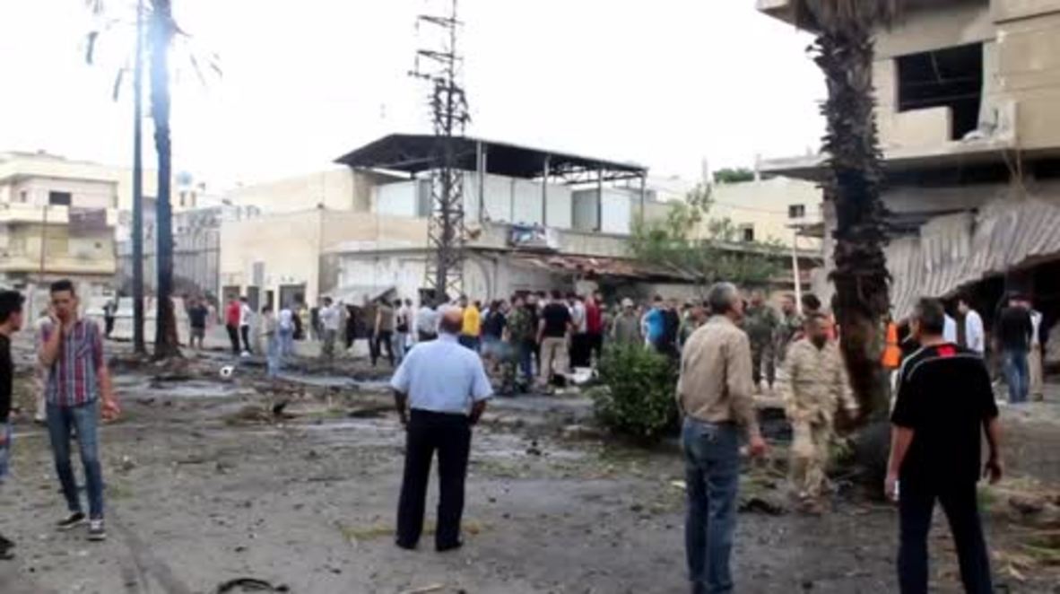 Syria: 2 dead, scores injured in Homs car bomb after militants withdraw from city