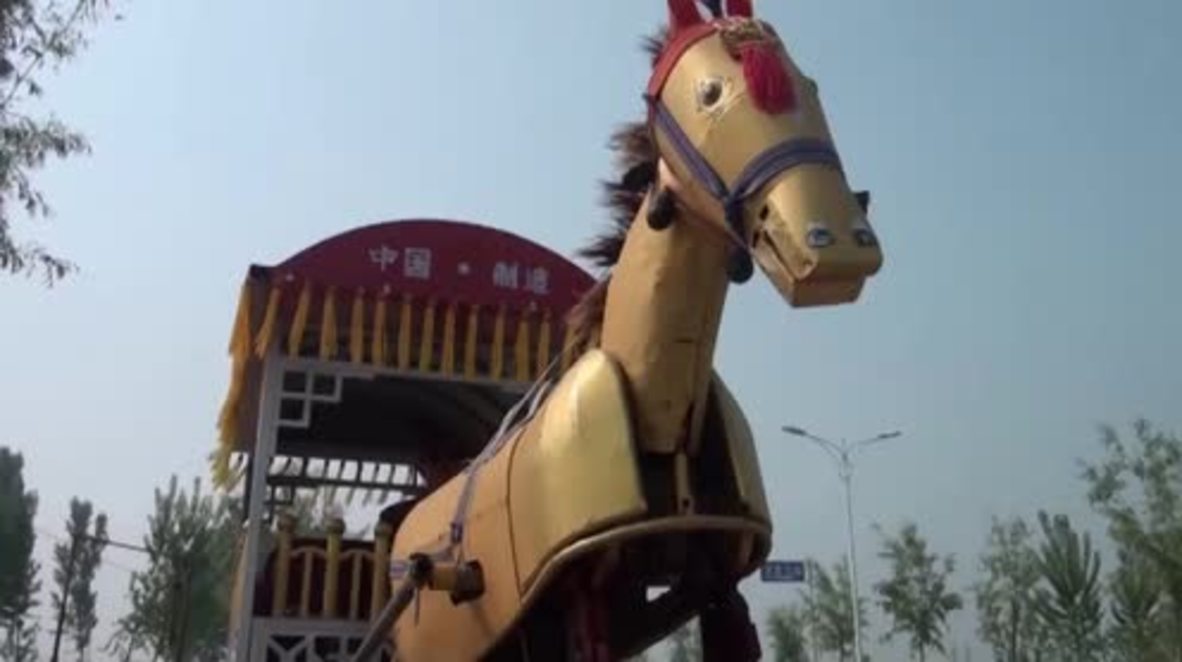 China: 'I feel I am a flower' - Henan farmer builds IRON HORSE automata to pull him around town