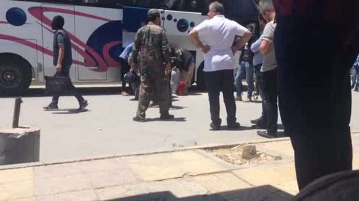 Syria: Last group of militants depart Damascus suburb of Barzeh