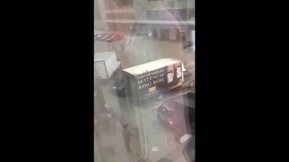 Russia: Wind turns booth upside down with guard still inside