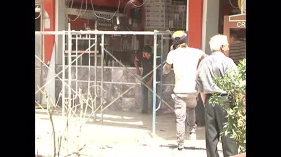 Iraq: Kerrada residents begin clean-up following deadly ice cream shop bombing
