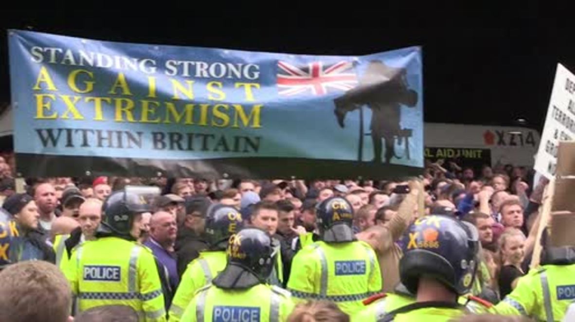 UK: EDL 'Gays against Sharia' march is confronted by counter protesters in Manchester