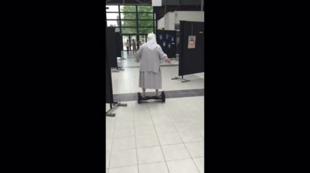 Habit on a hoverboard! This nun has a new set of wheels