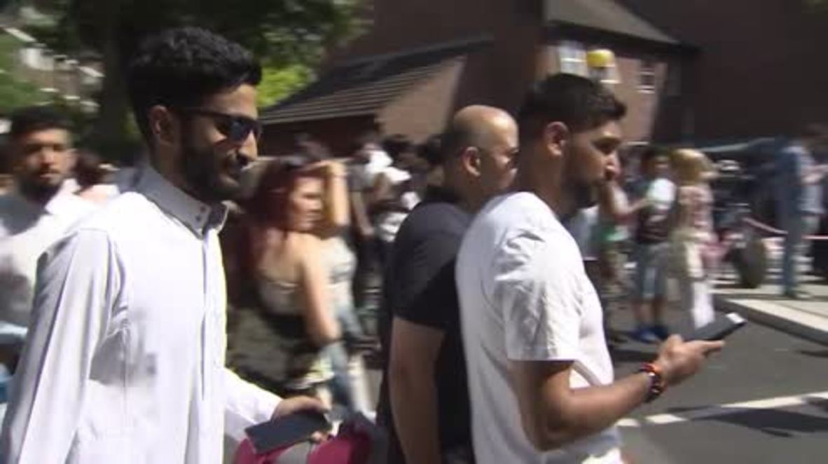 UK: Boxer Amir Khan vows to support Grenfell Tower fire victims during visit