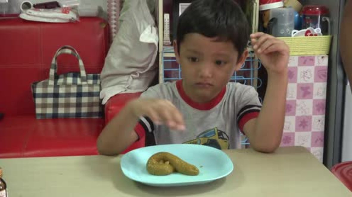 Would you snack on this POO-SHAPED pudding?