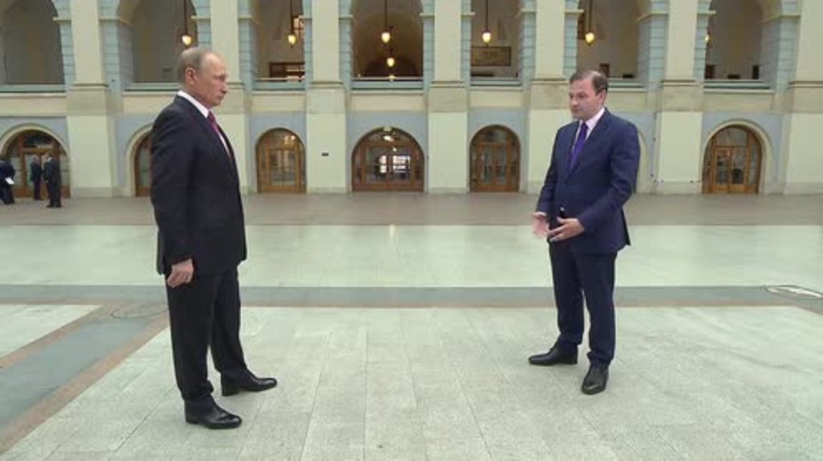 Russia: Putin says work in KGB had ties to non-official intelligence